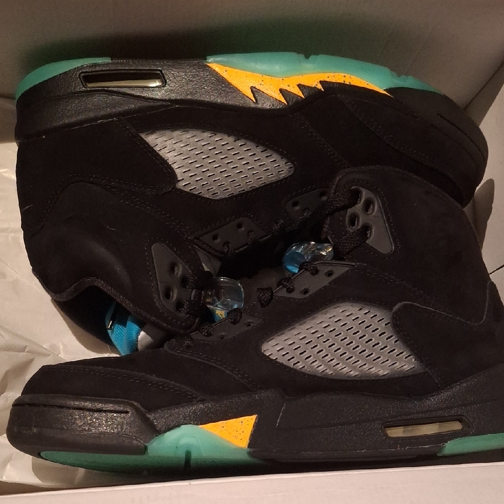 Black and Gray Sneakers with Yellow and Green Accents